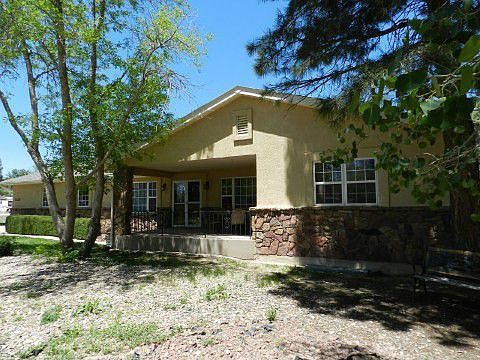 Covered front porch and new stucco