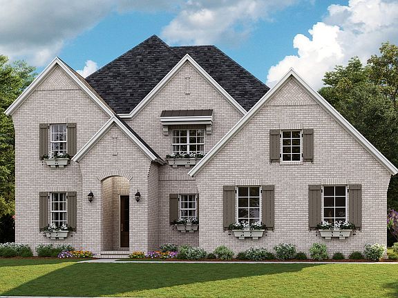 Huntley B - English Cottage 3-Car Side Load Garage Note Renderings may show optional features