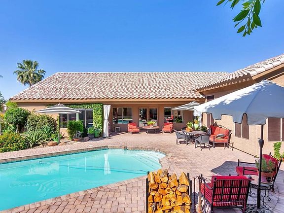 Gorgeous pavers surround the pool