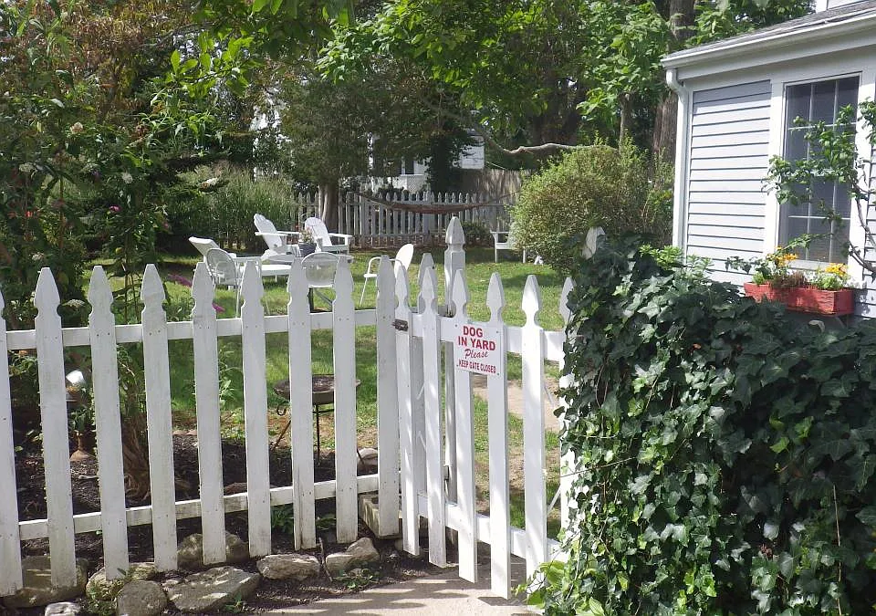 The cottage yard is totally fenced in for the safety of pets.
