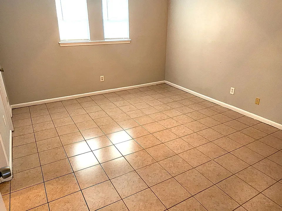 Spacious and well lit room.