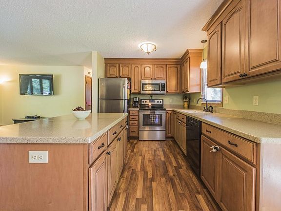 Lots of counter space here to prep your meal.    Open floor plan concept rarely found in a home this age.
