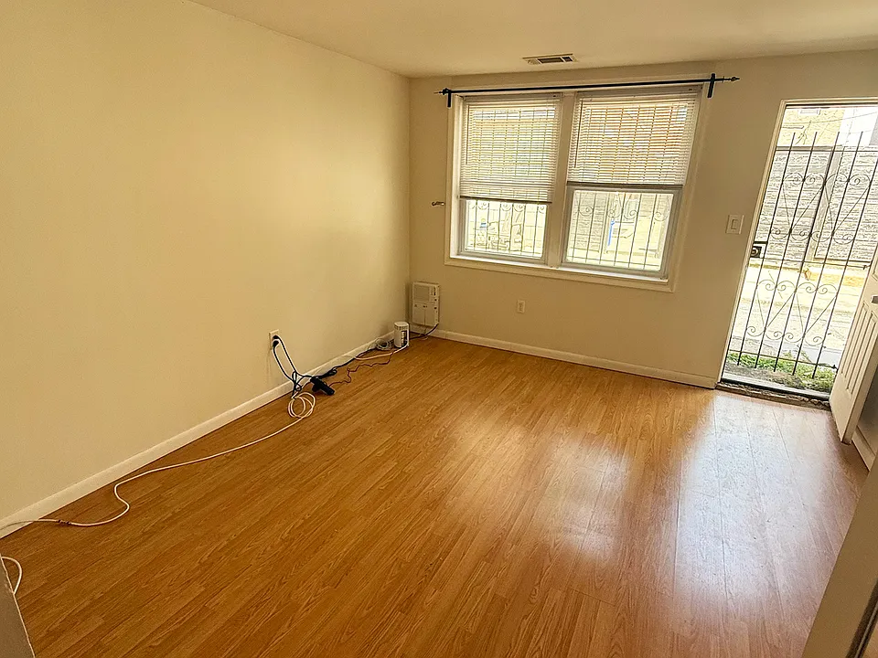 Back bedroom, with available back door + gate to Fairhill St.