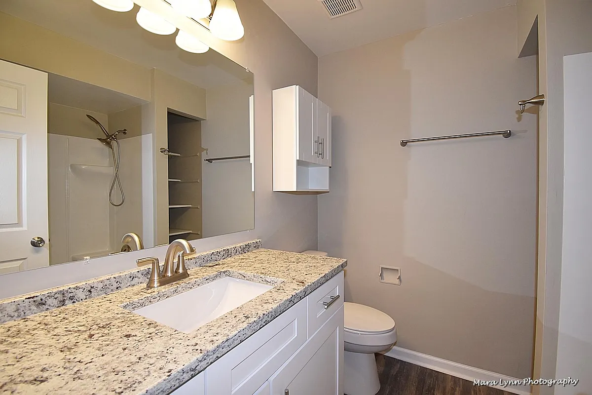 Updated bathroom with granite countertops - 598 Rush St #C
