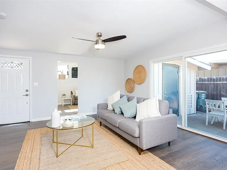 Entry Room (Dining or Living Room) w/ view of Laundry Room Door and Patio
