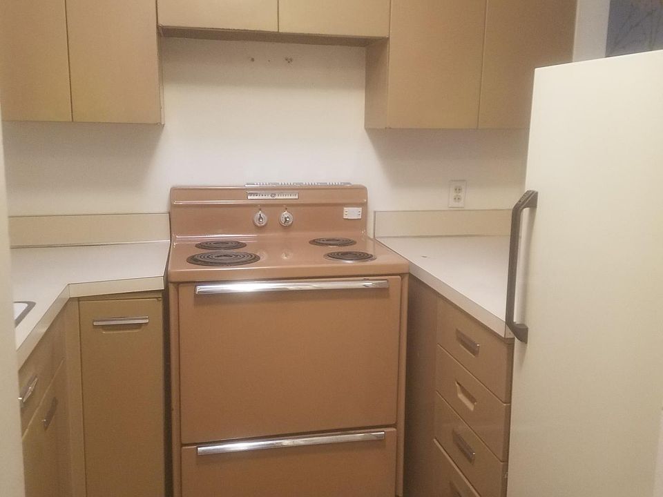 Kitchen with tile floors, lots of storage.