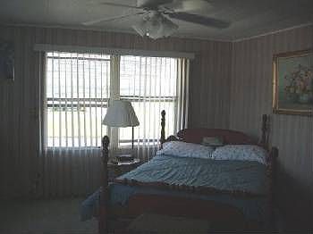3rd image of 28 NE Pinelake Village Blvd