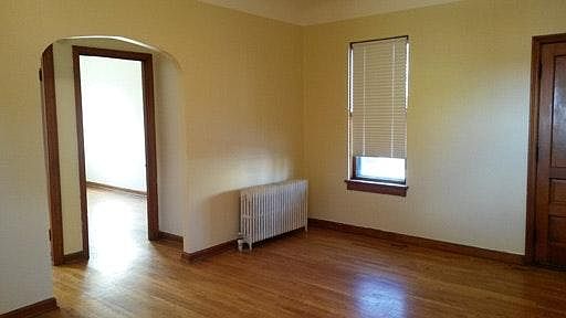 Living room peaking into bedroom #1