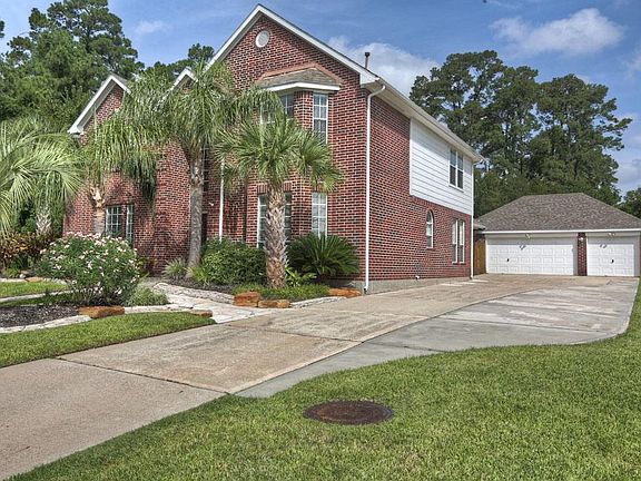 3 car detached garage with extended width driveway