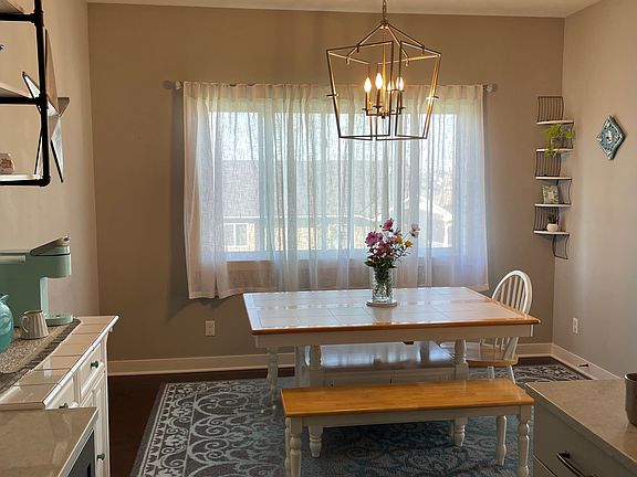 Kitchen area with large cabinets, gas stove, microwave, new dishwasher installed in 2025.