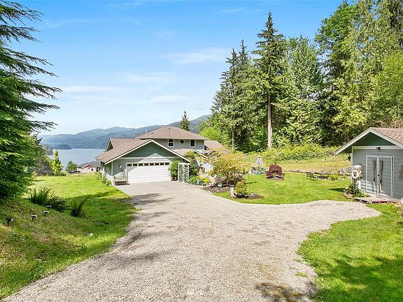 Gated entry and private driveway with ample parking>