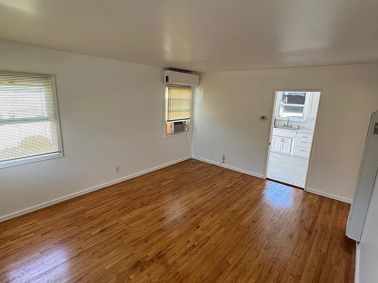 Livingroom with semi-split air conditioner and heater