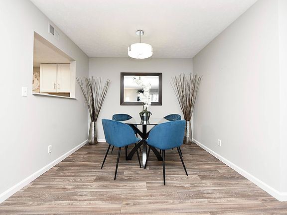 Dining Room + Hardwood Style Flooring