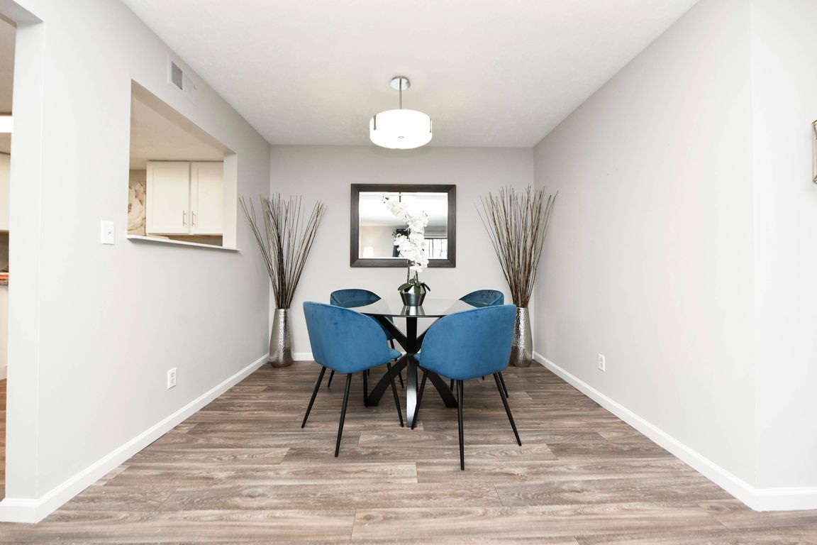 Dining Room + Hardwood Style Flooring