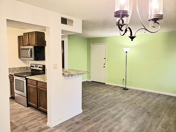 The chandelier will be replaced with a ceiling fan prior to move in.
