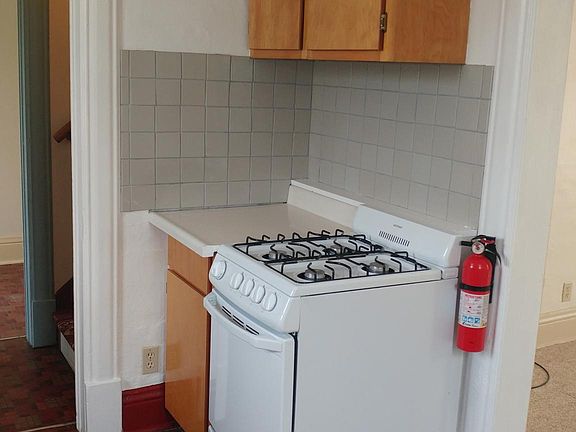 Kitchen with gas stove.