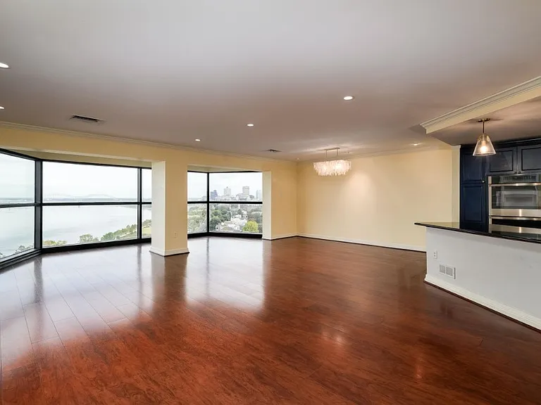 Extra large open living and dining space. Living room has built in bookcases.