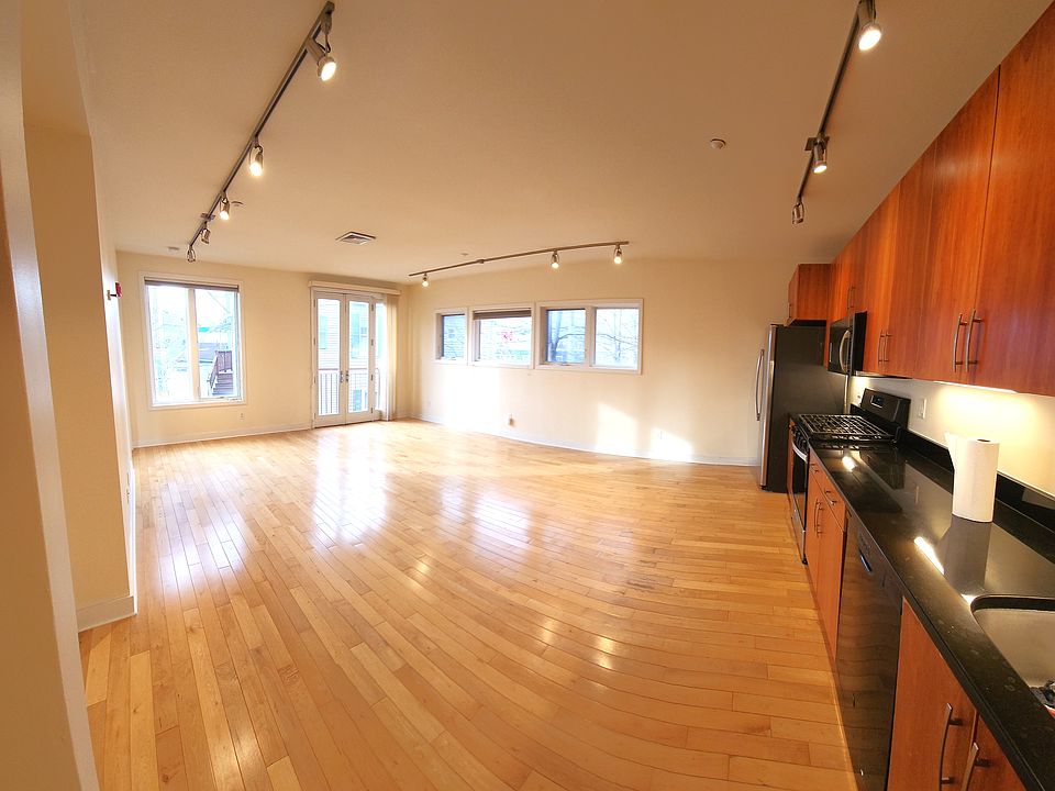 Open concept living/dining areas & kitchen.