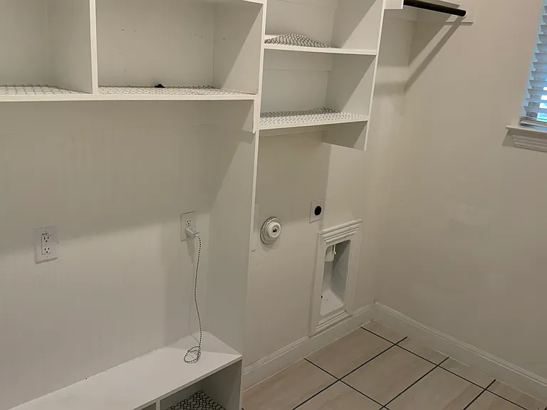 Laundry/mud room just as you enter the home from the garage