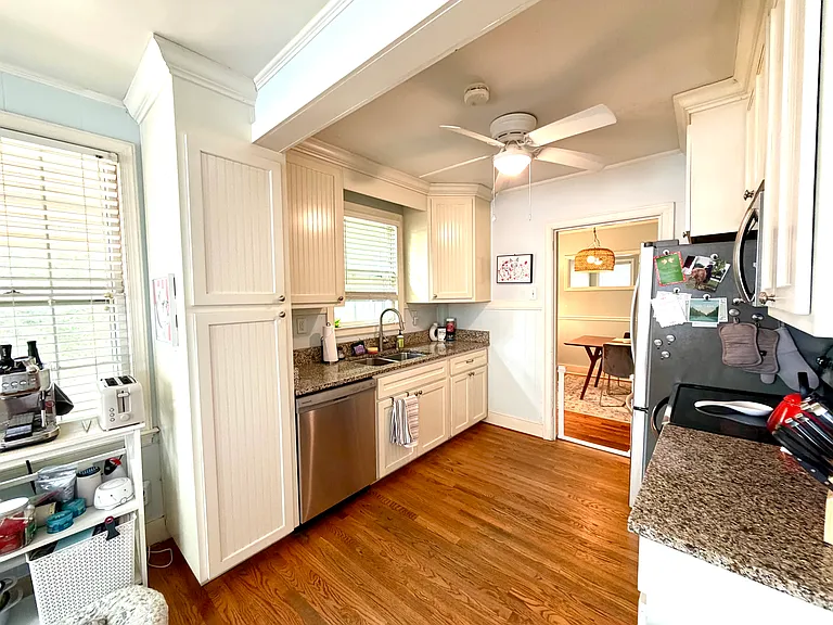 Kitchen facing back to dining room