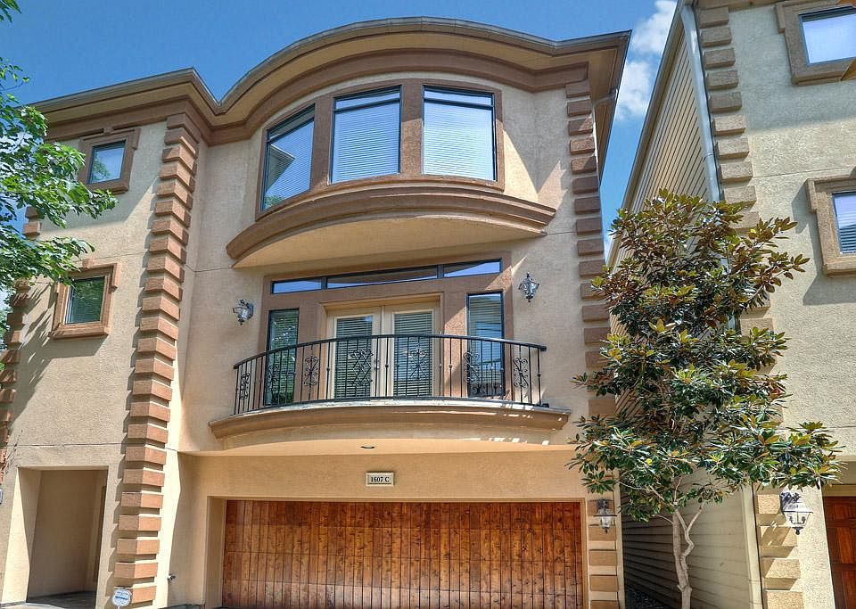 1607-C Bass, a secluded, free-standing townhome off the Washington Corridor convenient to shopping, restaurants, and nightlife.