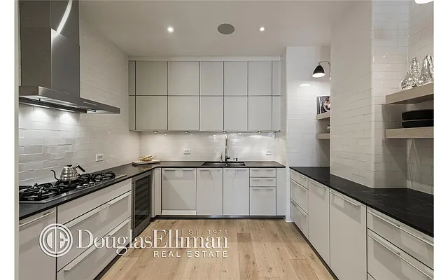 Sold by Douglas Elliman | media 10