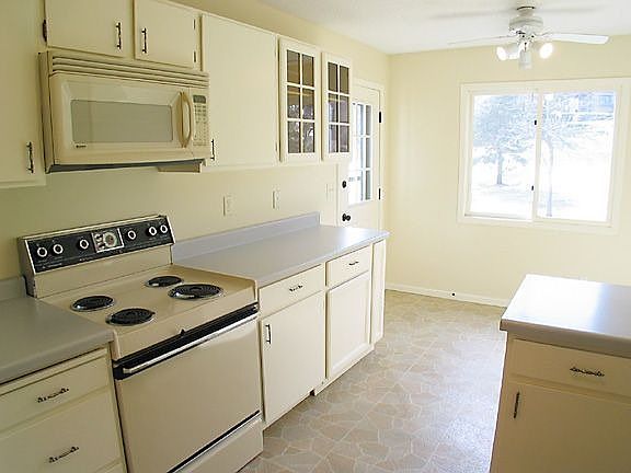 Eat-in kitchen with access to deck.