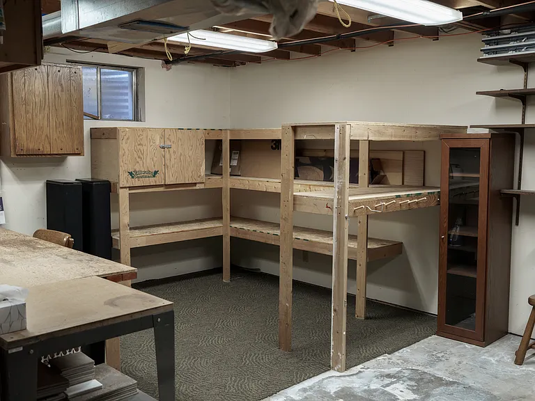 unfinished storage/laundry/work bench