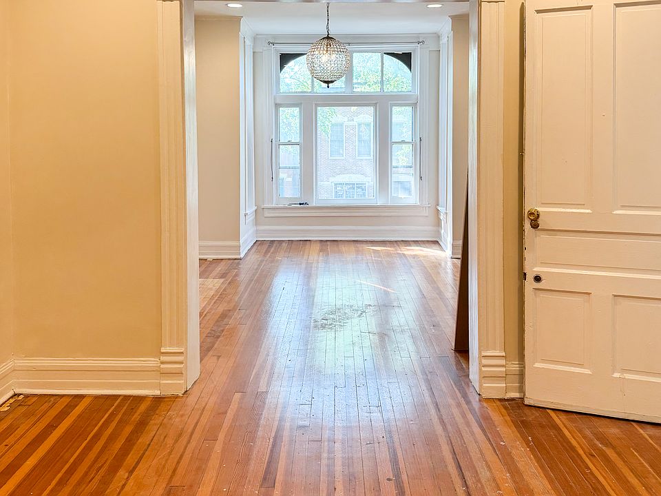 dining room w/ living room in backdrop