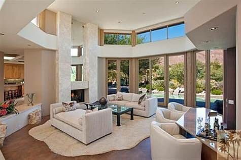 Amazing contemporary custom with tall ceilings and walls of glass.