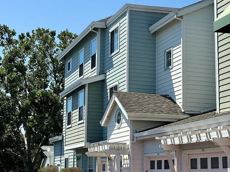 Side View of Garage and 3rd Floor Unit
