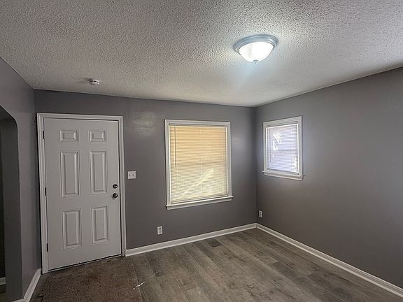 Front door and Living Room.