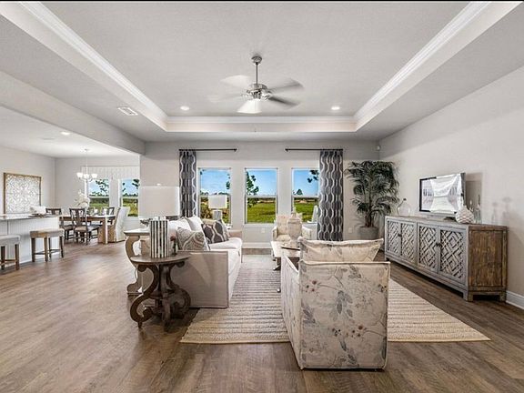 This photo is from another Victoria home that is furnished. View out back not accurate.
