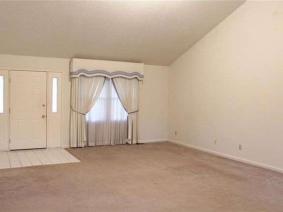 Different angle of the living room showing the window.