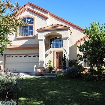 Beautifully Landscaped Executive Home