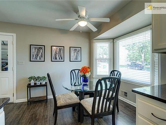 A bay window let's the sun light stream in.