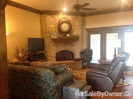 Beautiful living with stone fireplace : Beautiful living room with stone fireplace