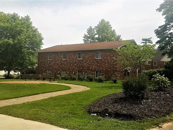 Back of building, next to Frontier Park