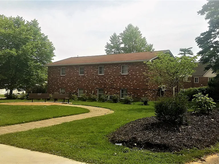 Back of building, next to Frontier Park