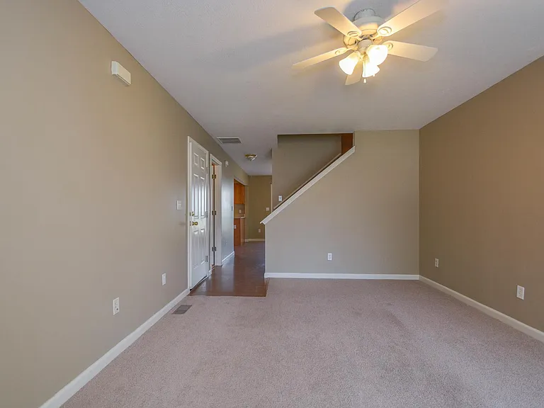 Actual living room has modern vinyl flooring and paint may not be the same shade as depicted in the picture.