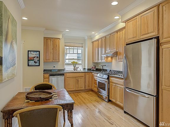 Hickory cabinets complement the kitchen features.