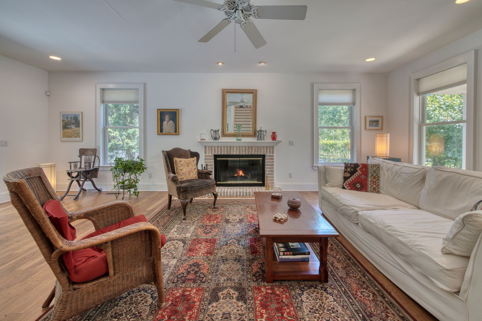 Living room with wood burning fireplace