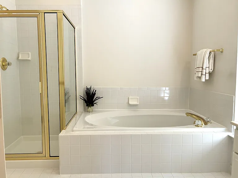Primary Bathroom with Separate Shower and Tub.