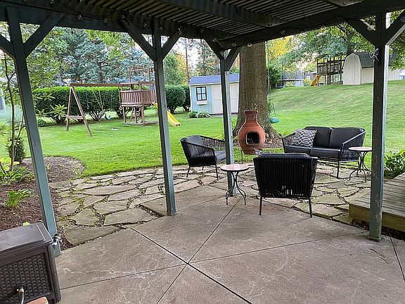 Back patio, shed, swing set