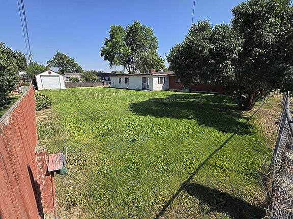 Back of house, yard, & shed