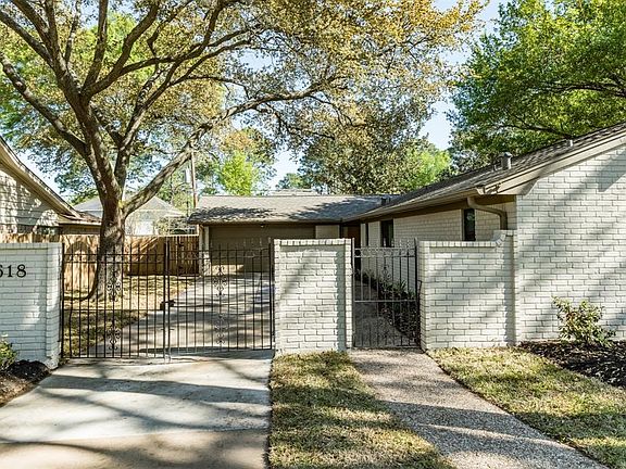 Long driveway to the two car garage!