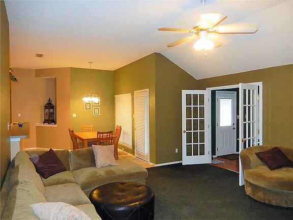 A second living space, french doors are entrance to 20x22 game room