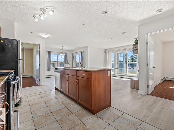 4th image of 12660 142nd Ave NW #114