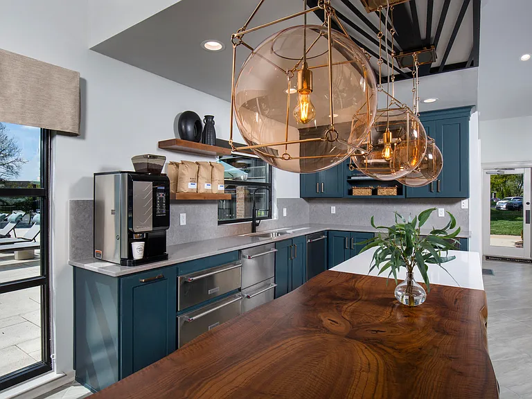 Resident lounge with community kitchen and gourmet coffee bar
