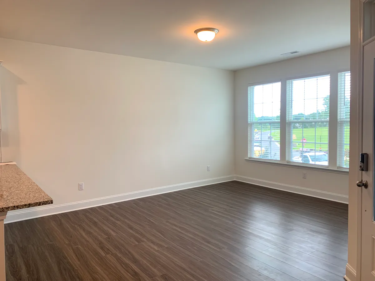 Living area with LVP - 1818 Grassy Falls Ln